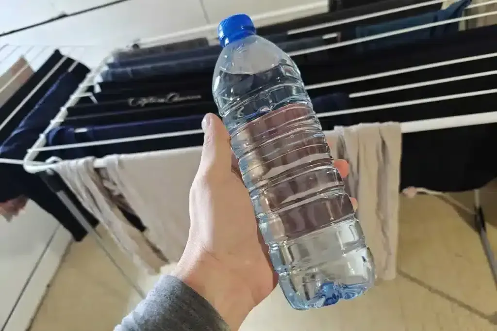 De waterfles-hack: zo droog je je was sneller